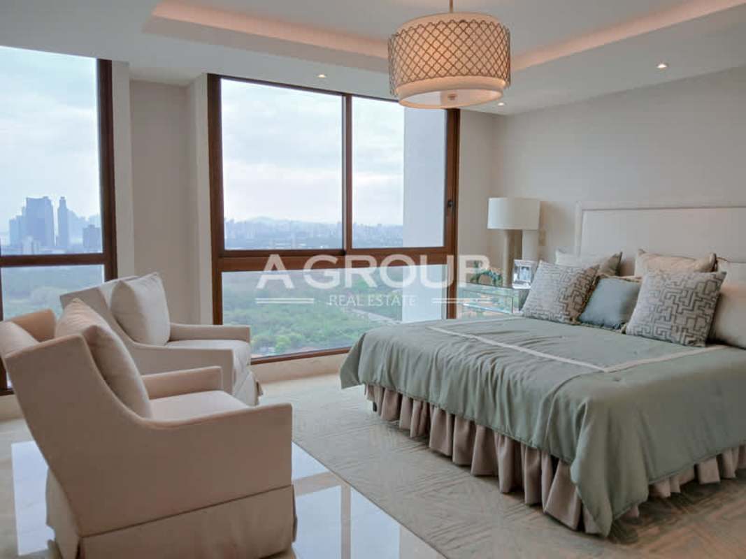 Large guest bedroom with closets and windows luxury apartment Panama