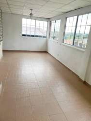 Bright enclosed balcony or sunroom with large windows tiled flooring in Altamira Vacamonte Panama