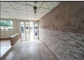 Hallway inside house featuring glass double doors tiled floor Altamira Vacamonte Panama