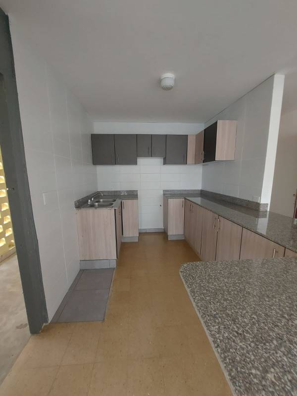 Open living and dining room with large windows PH Vista Hermosa