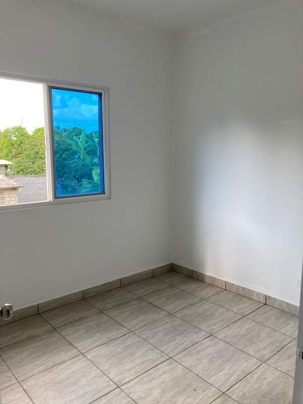 Empty bedroom new apartment PH Villa Lua with tile floors, light, garden views