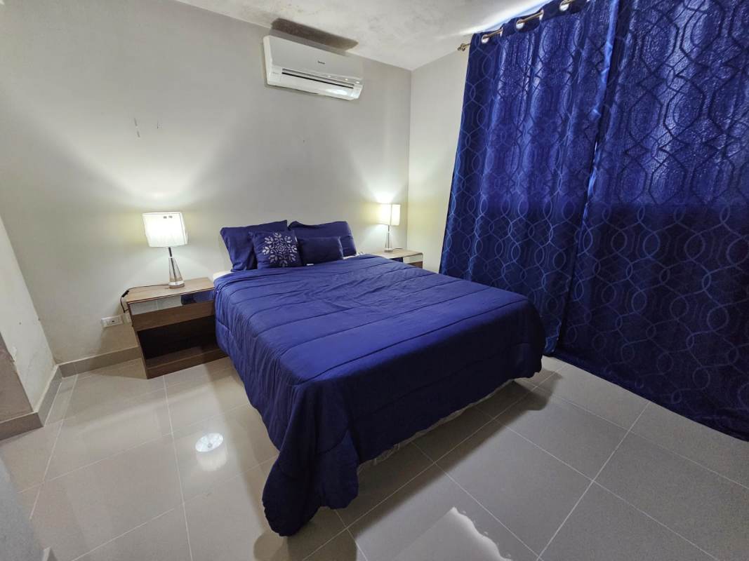 Modern kitchen with granite countertops, stainless appliances, cabinets in PH Carrasquilla Park Panama