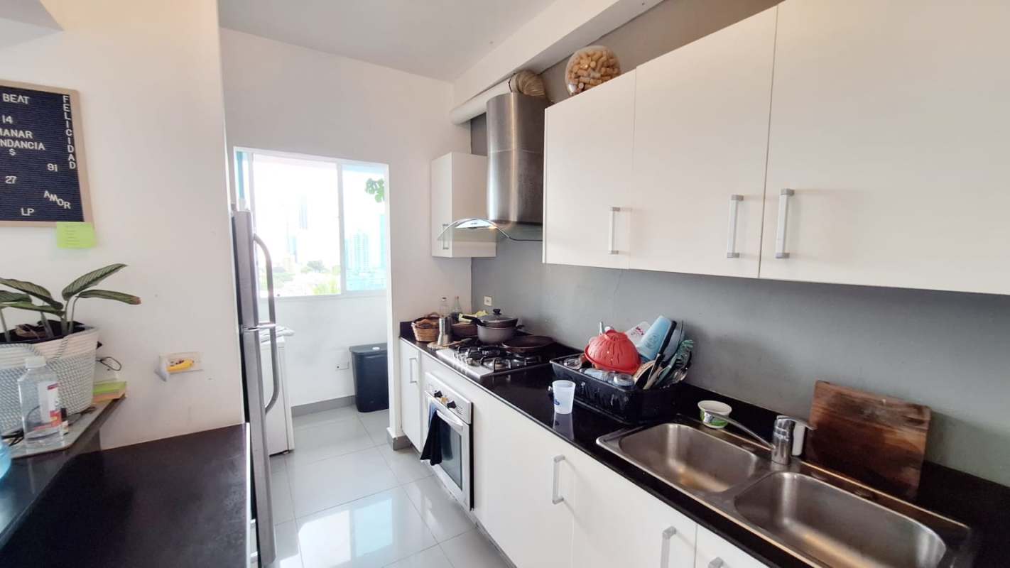 Spacious bathroom with glass shower enclosure and floating vanity in PH Quartier 74 San Francisco Panama