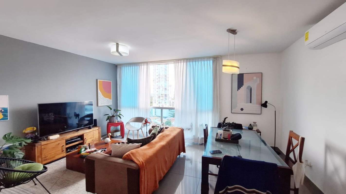 Contemporary kitchen with granite countertops, white cabinets, and stainless appliances in PH Quartier 74 San Francisco Panama