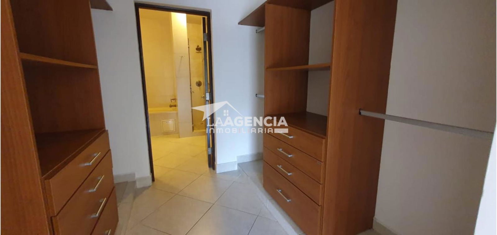 Kitchen with granite countertops, wood cabinetry and stainless appliances at Embassy Club Clayton