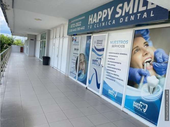 Retail spaces with glass fronts and signage in busy commercial plaza El Dorado Panama