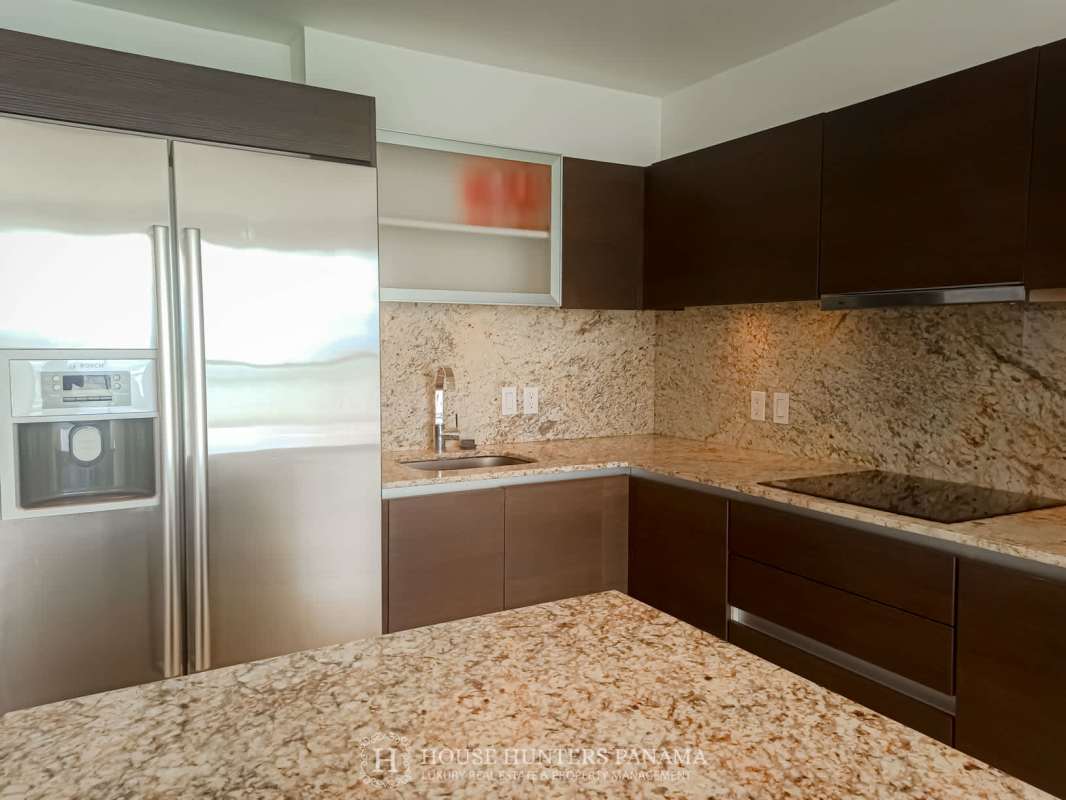 Marble bathroom with glass walk-in shower in The Ocean Club Condo Punta Pacifica Panama City