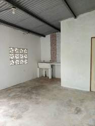 Basic kitchenette in unfinished concrete with utility sink in La Espiga La Chorrera