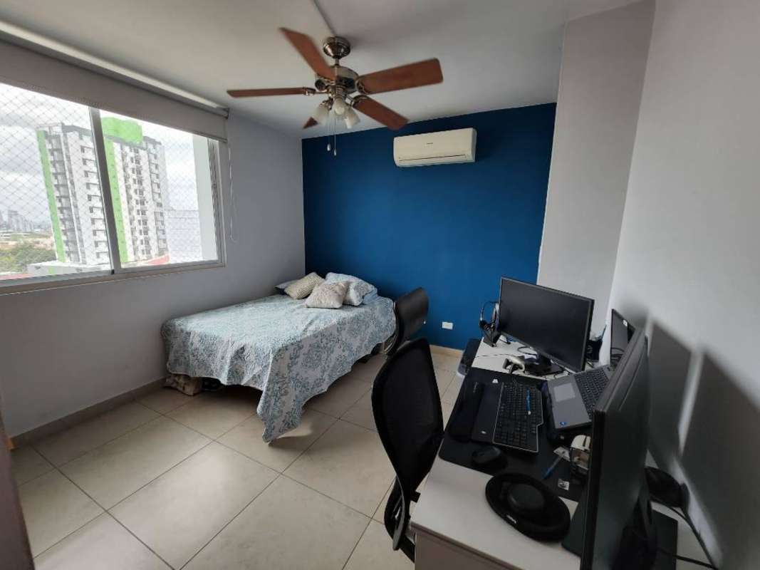 Living area with panoramic city and ocean views floor-to-ceiling windows PH Parklane Tower Panama City