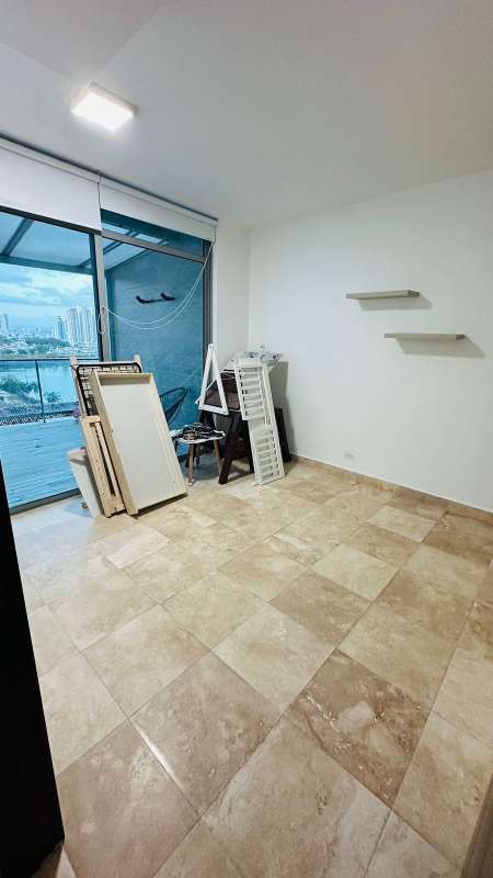 Spacious living dining area with marble floors, ocean view windows PH Grand Tower Punta Pacifica Panama City