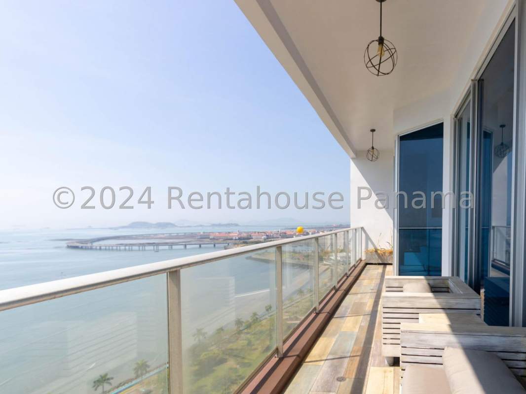 Spacious master bedroom with ocean views, large windows in PH Destiny Tower Panama City Panama