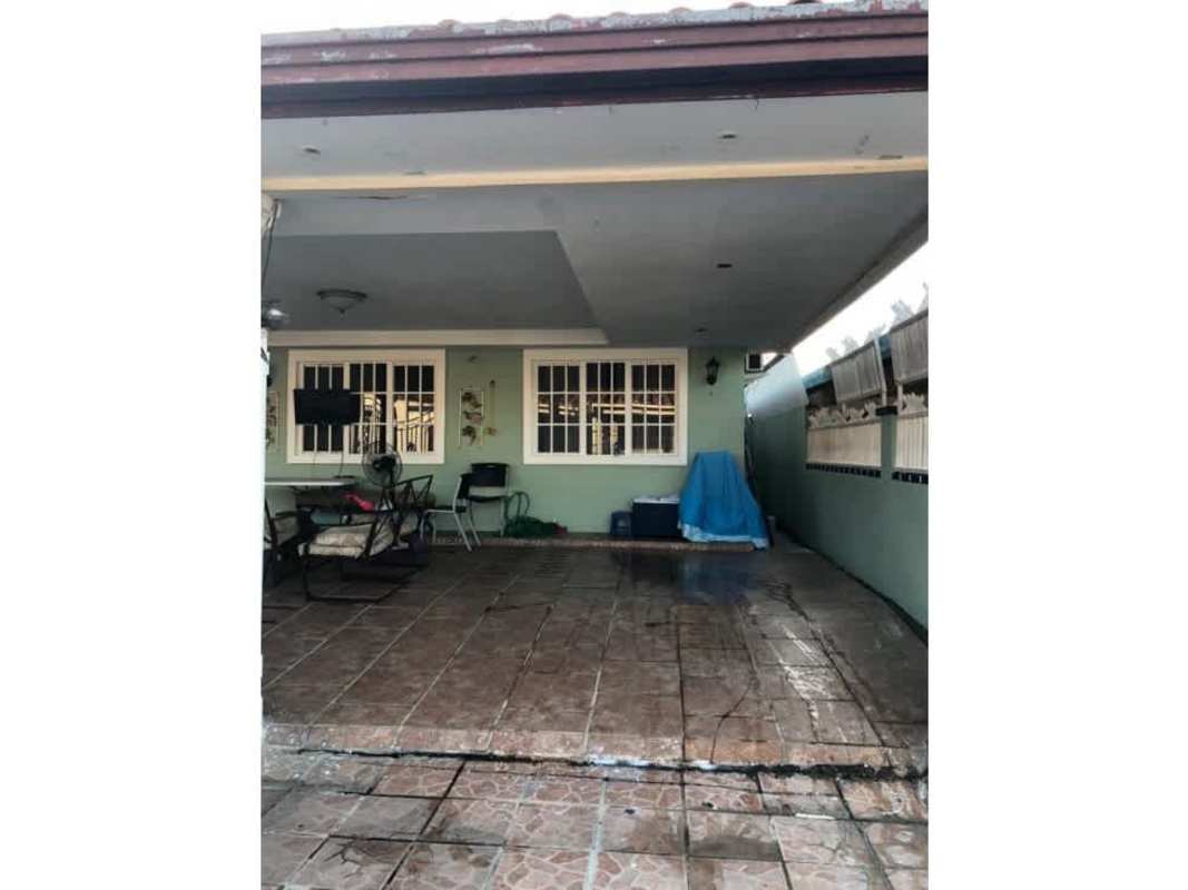 Spacious covered parking and outdoor patio with green wall at El Romeral Chanis Panama