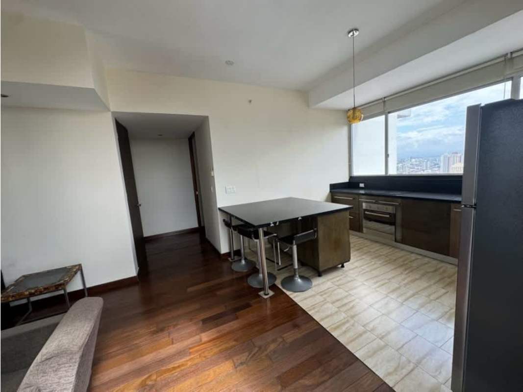 Modern kitchen with granite countertops, island and city view in PH Denovo Obarrio Panama
