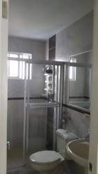 Bright unfurnished living dining area with natural light opening onto garden terrace Playamar Playa Dorada