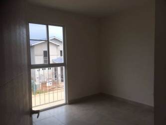 Empty bright bedroom large window tiled floor in beach house for sale Playamar Panama