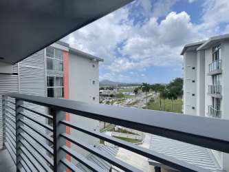 Covered balcony with views to internal courtyard of PH Mosaic Howard Panama Pacifico