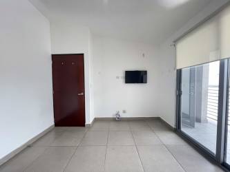 Living dining space with balcony door PH Mosaic Howard Panama