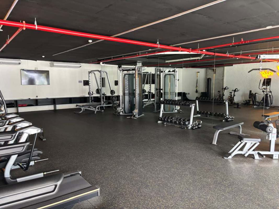 Swimming pool with lounge space at residential tower Panama Viejo Residences