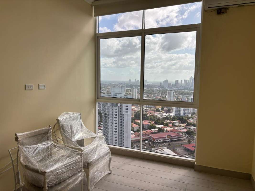 Balcony with panoramic skyline view from high-rise apartment in PH Bonavista at the Park Panama