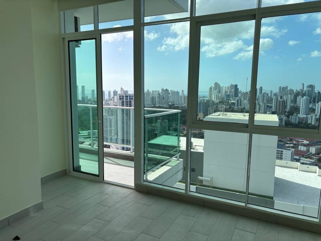 Kitchen with granite countertops and wood cabinets in PH Bonavista at the Park Panama