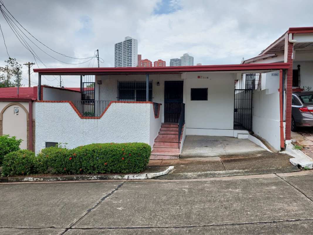 Single-story house with carport front stairs and porch in Villa de las Fuentes Panama