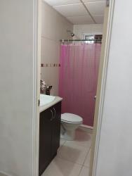 Traditional kitchen with white cabinetry and tile mosaic Vacamonte Panama Oeste
