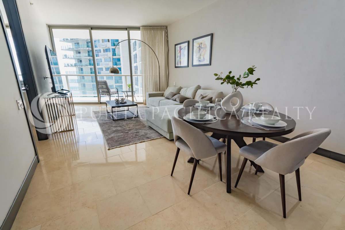 Luxury bedroom with floor-to-ceiling windows and Pacific Ocean view in The Ocean Club Panama