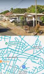 Single-story house with front porch, metal gate, and yard in Chitré Panama