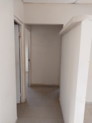 Backyard area with tree and fenced garden in house for sale Chitré Panama