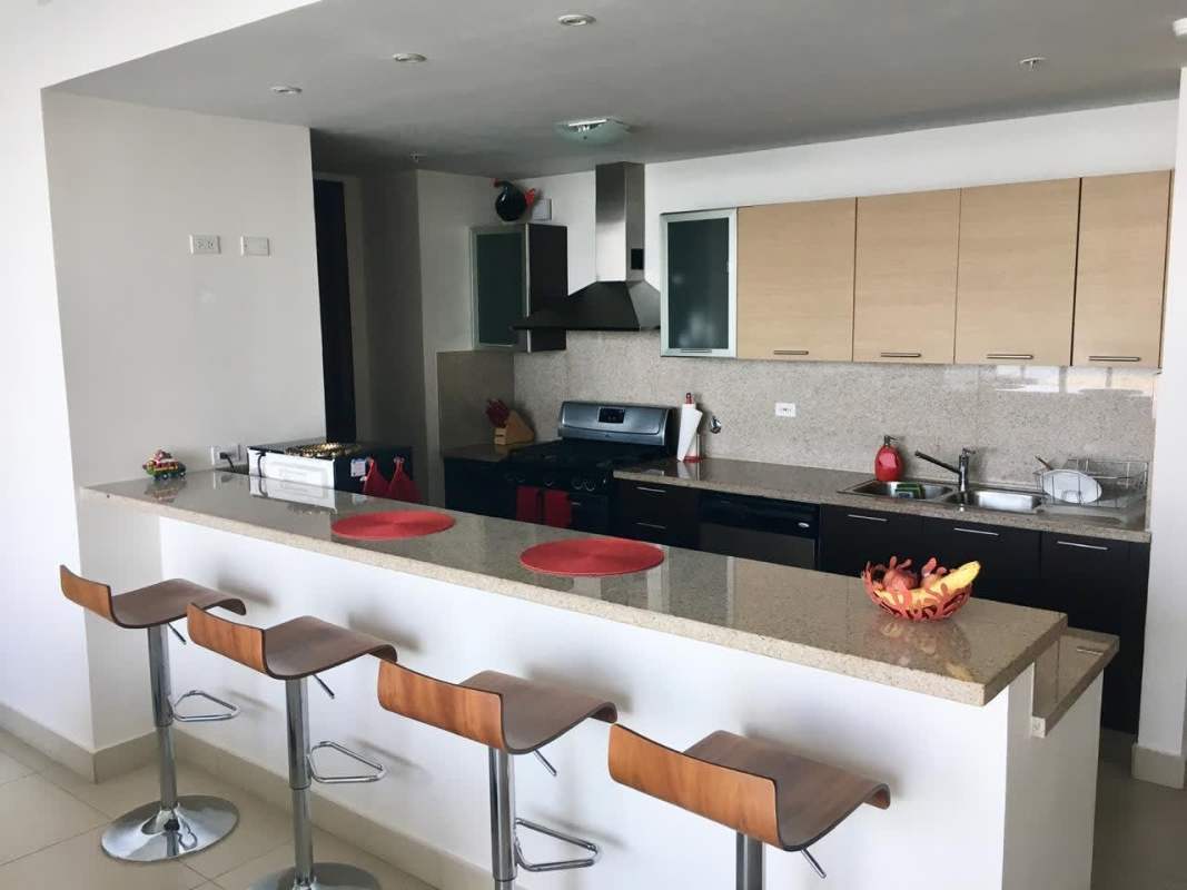 Contemporary kitchen with granite countertops and modern appliances in Punta Pacífica rental