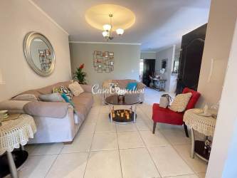 Comfortable TV room with tiled flooring, natural light and contemporary decor Chiriqui rental house