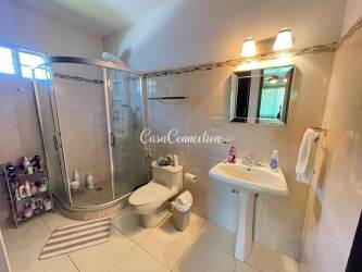 Comfortable bedroom with AC, ceiling fan and lake view in furnished house Chiriqui rental