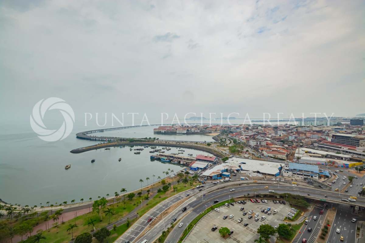 Bright open living room with marble floors and skyline view at The Sands Panama