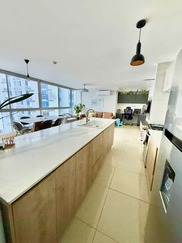 Open concept kitchen with quartz counters and cabinetry PH Coral Tower Carrasquilla Panama