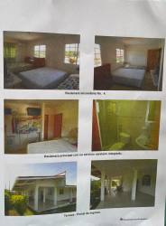 Covered porch seating area overlooking gardens Chame Panama Villa del Sol