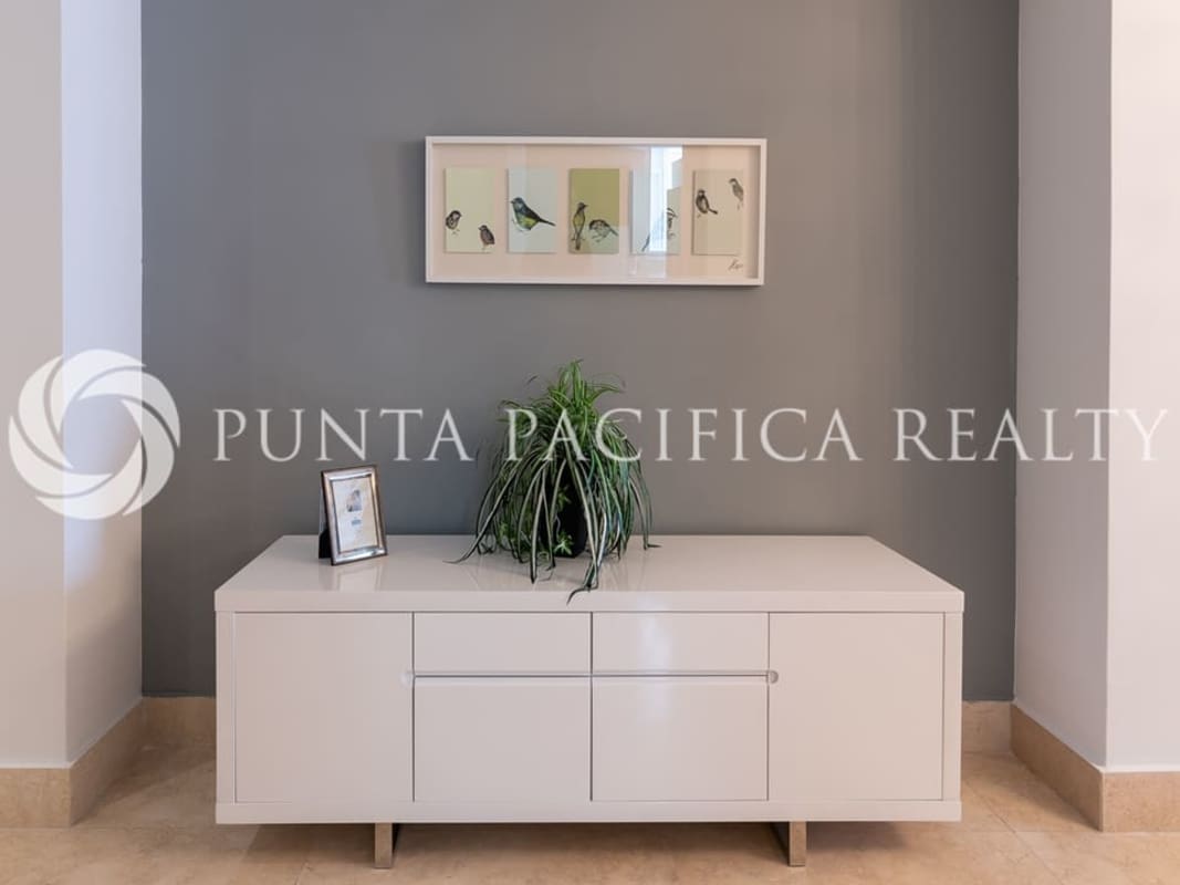 Luxury bedroom with large windows overlooking ocean, designer finishes in PH Yoo Panama City