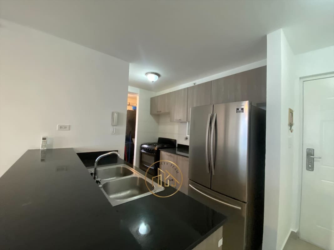 Living room with access to balcony and city skyline view PH Coral Towers Carrasquilla Panama