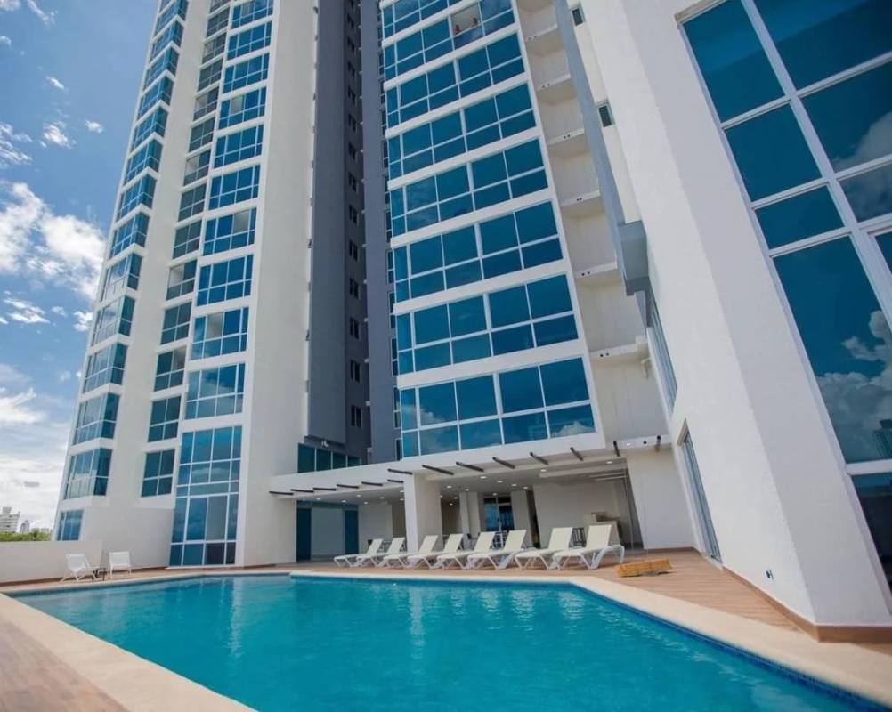 Modern high-rise facade and outdoor pool at PH Coral Towers Carrasquilla Panama City