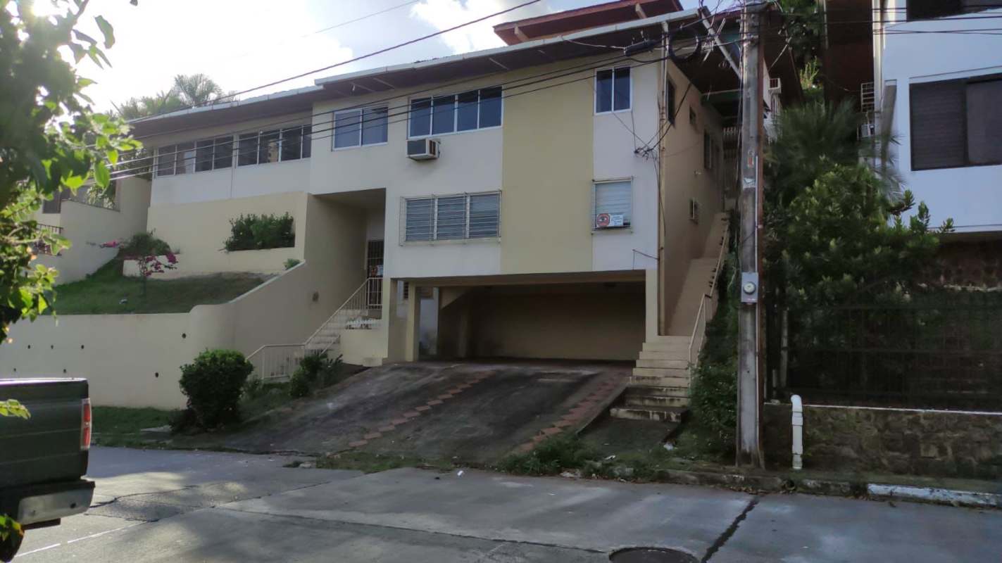 Spacious living room with tiled floors and large windows Panama