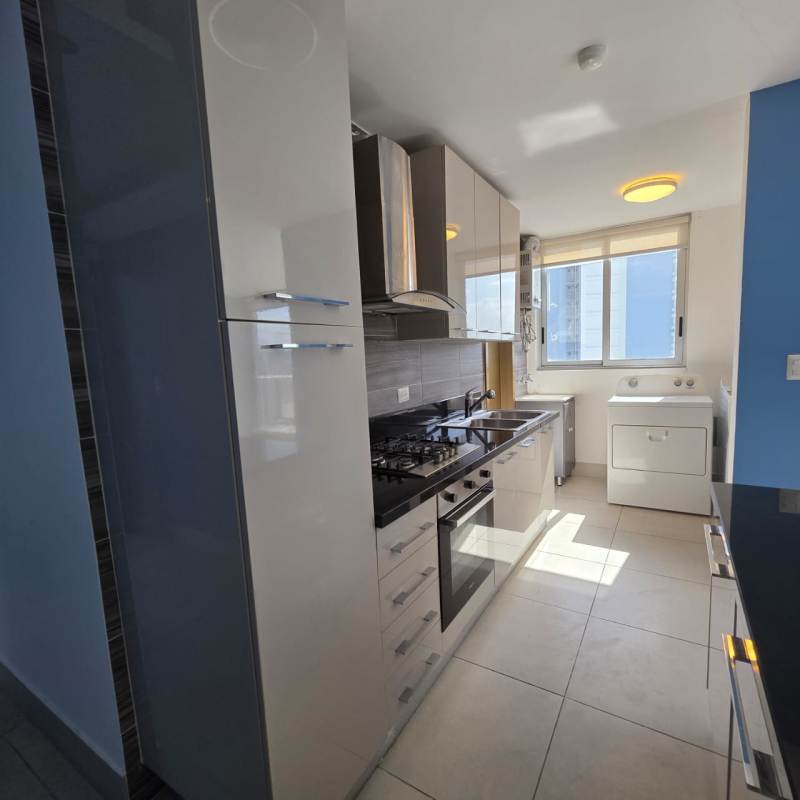 Bright furnished living room with panoramic windows and city view in PH Park City Obarrio Panama