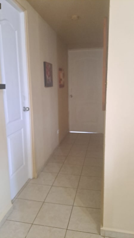 Hallway leading to bedrooms with tiled floor and bright paint PH Mallorca Park Garden apartment