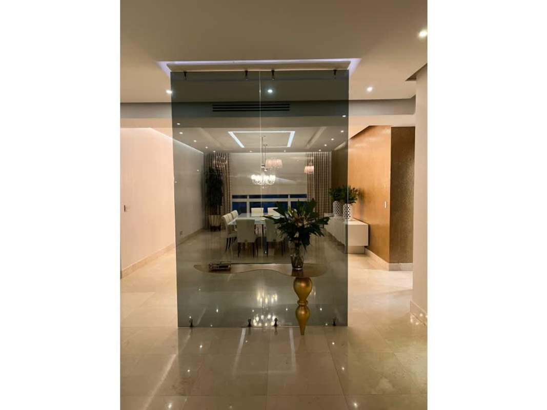 Family room with modern decor, marble floors, large windows PH Venetian Tower Panama