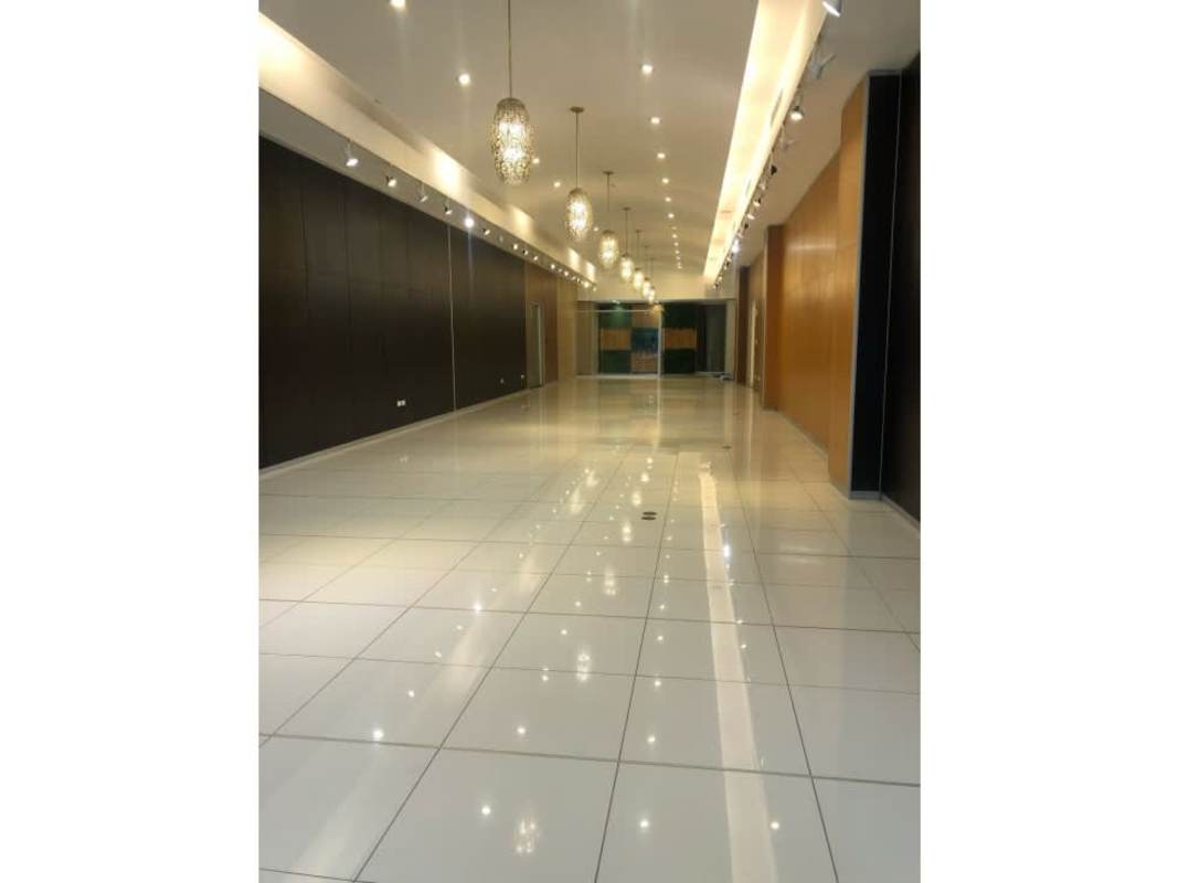Large empty storefront or office space with tiled floors and lighting in PH Obarrio Business Center Panama City