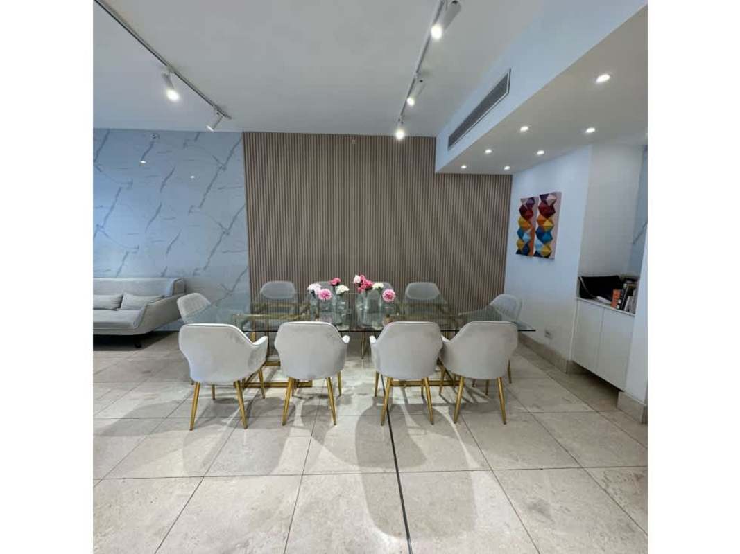 Open-concept kitchen with granite countertops and stainless steel appliances in PH Deluxe Residence Panama City