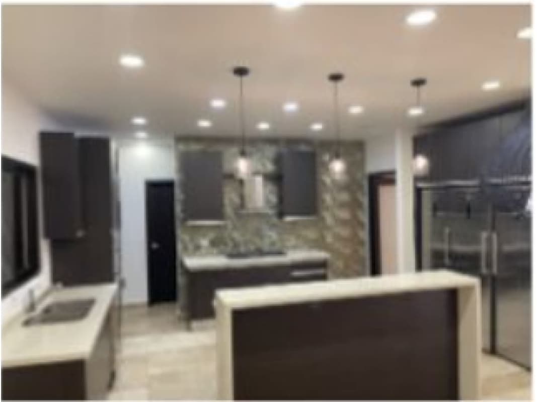 Spacious living room with access to backyard and natural light in Sunset Coast Costa Sur Panama