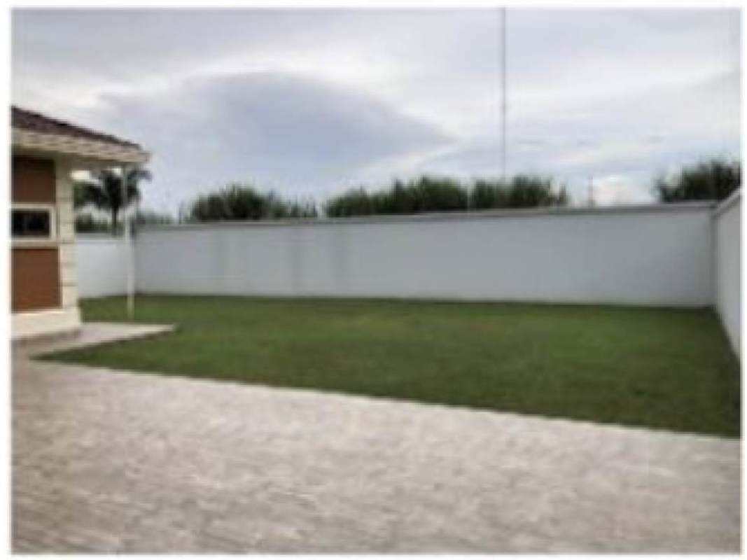 Large swimming pool, tennis court, landscaped amenities in Sunset Coast Costa Sur Panama City
