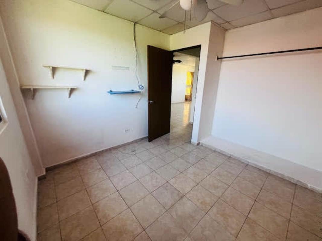 Swimming pool with deck and palm trees at PH Cantabria V Don Bosco residential complex Panama City