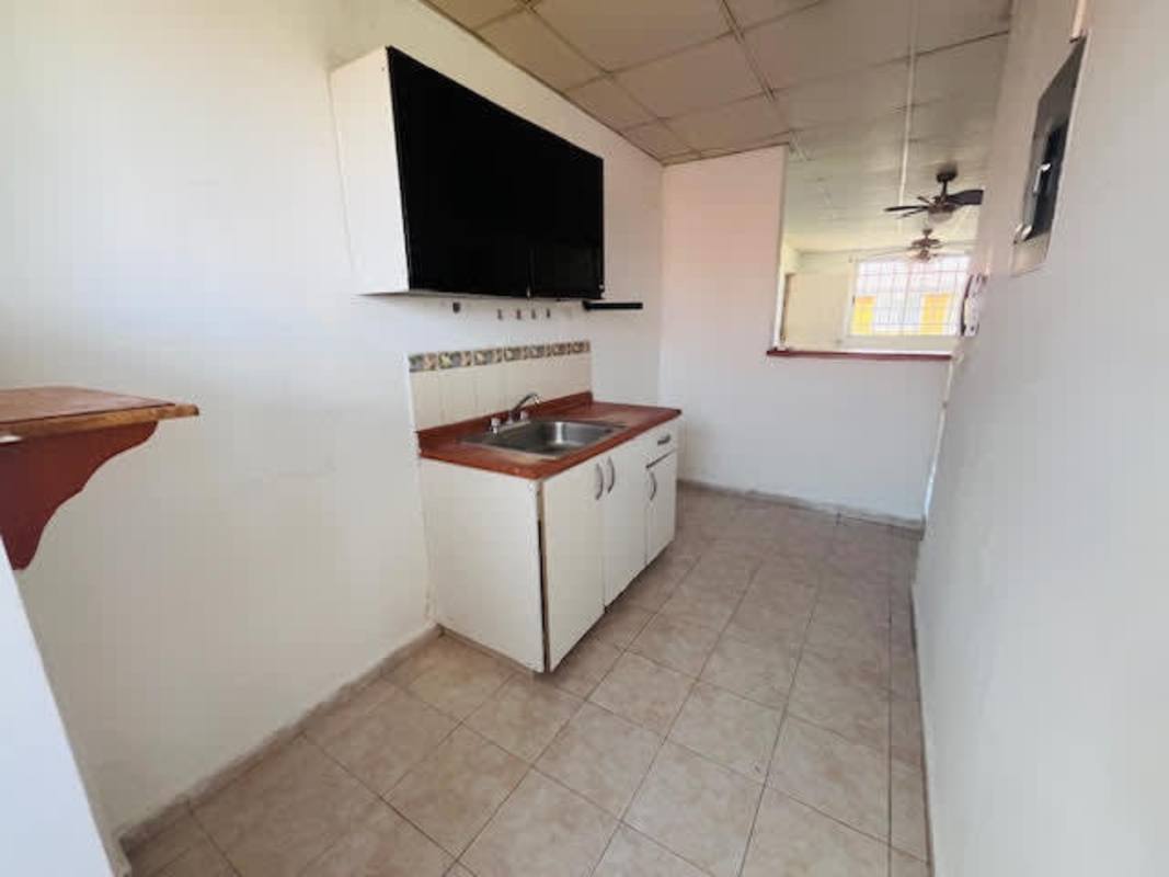 Bedroom with natural light and ceramic tile floor in PH Cantabria V Don Bosco Panama apartment for sale