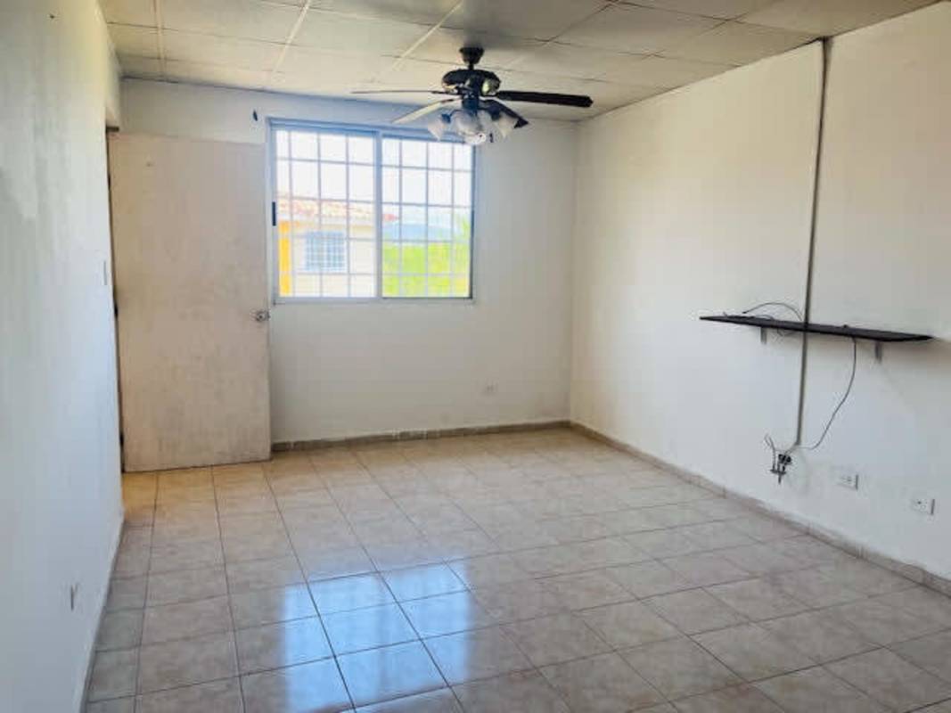 Compact minimalist kitchen with cabinets and tile floor in PH Cantabria V Don Bosco affordable apartment Panama City