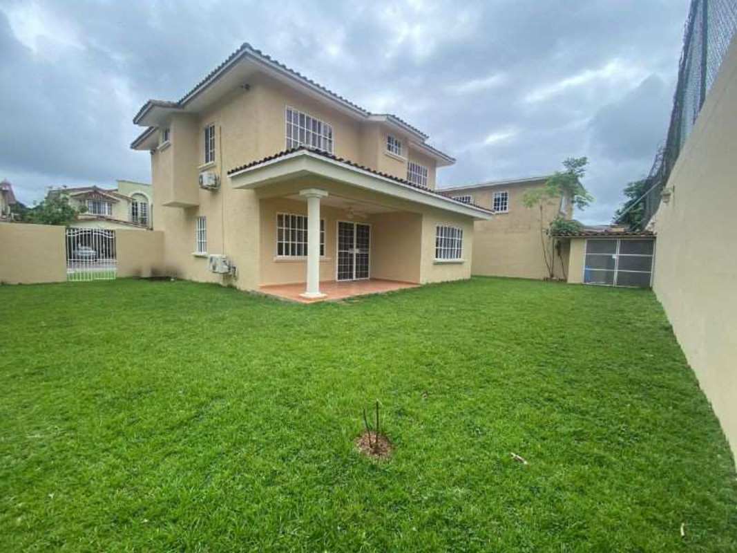 Contemporary U-shaped kitchen with stainless steel appliances and breakfast nook in Albrook Gardens home Clayton Panama